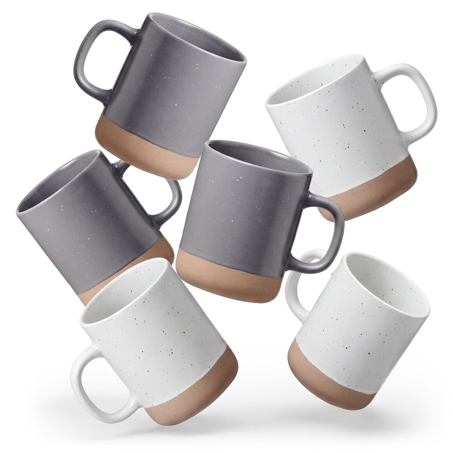 Sechs Steingut Tassen schweben in der Luft.